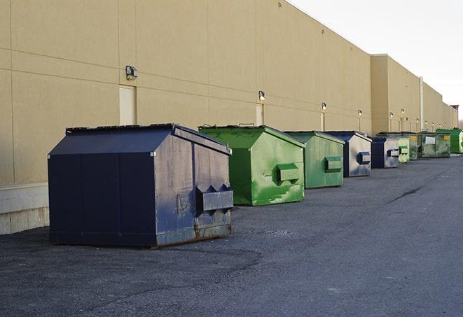 red and green waste bins at a building project in Atlantic Beach, NY